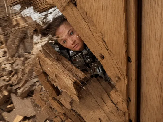 extreme closeup shot of a humanlike terminator robot breaking through a wooden door, view filled with wood fragments, flying debris, flying fragments, broken door, broken door frame, flying dirt, wood chips, motion blur, realistic, gritty, cinematic, Michael Bay, action shot, freeze frame, super slomo, ultra detailed, ultra sharp, 8K, realistic, gritty