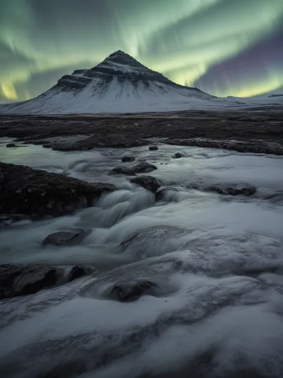 prize winning landscape photography of iceland at night with wildwater intersecting the magical landscape and the northern lights dancing in the sky reflected in the water, a very serene scene unlike any other, dark but beautiful, photorealistic, scenery,absurdres,hyper realistic lifelike texture dramatic lighting unrealengine trending on artstation,award winning photo,nikon RAW photo,8k,masterpiece,no humans, ,cold, winter, mountain, fog, lut, cinematic, dimmed colors, dark shot, muted colors, film grain, ice,iceland,aurora, Fujifilm XT3, with a (bokeh effect:1.3),